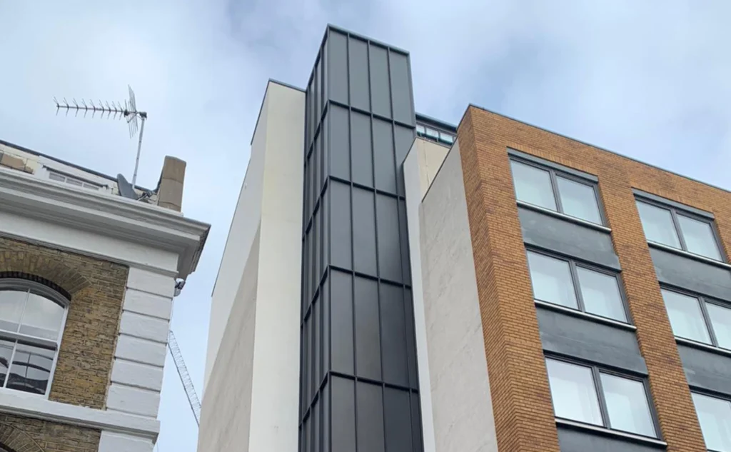Cladding services on a modern residential building