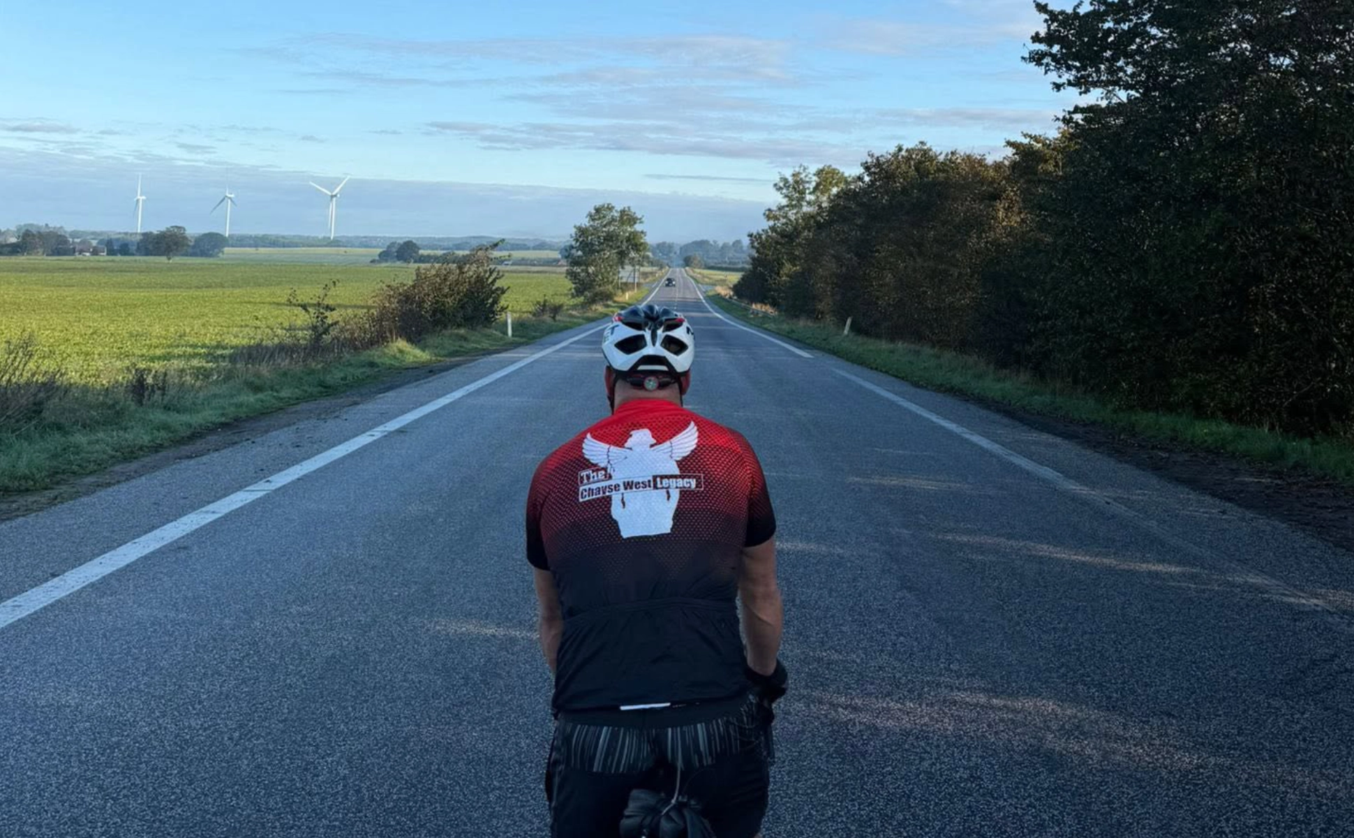 SHL Group charity cyclist during fundraising challenge